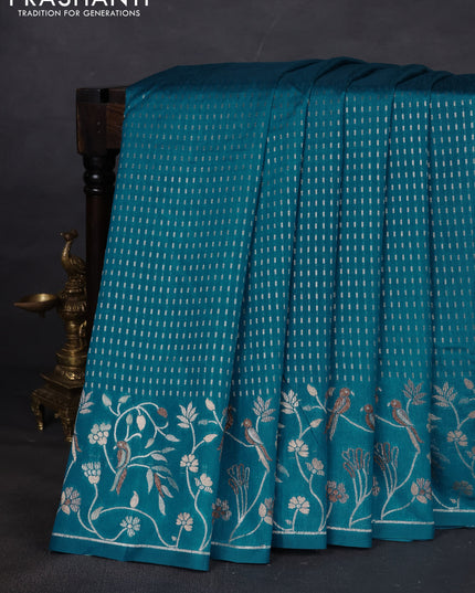 Art tussar saree peacock green with allover zari woven butta weaves and jamdhani style border