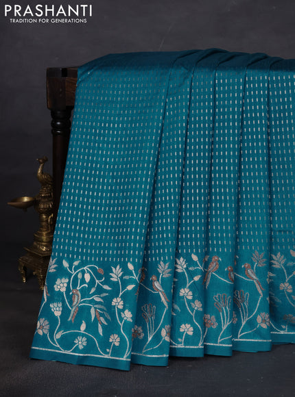 Art tussar saree peacock green with allover zari woven butta weaves and jamdhani style border