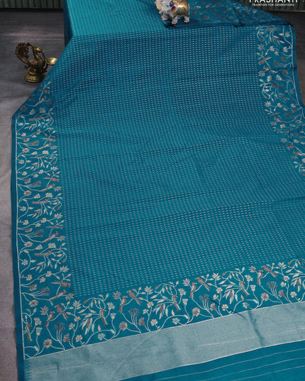 Art tussar saree peacock green with allover zari woven butta weaves and jamdhani style border