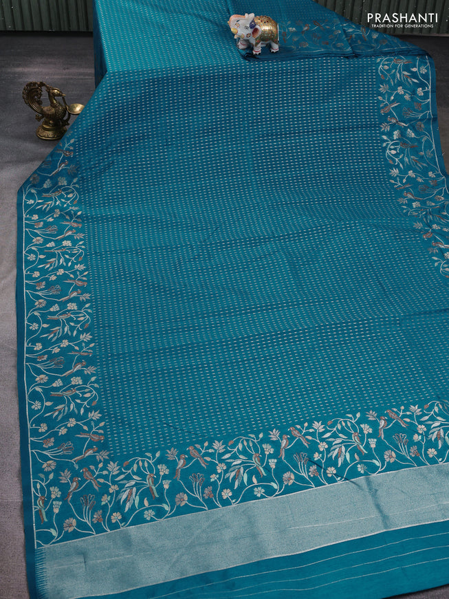 Art tussar saree peacock green with allover zari woven butta weaves and jamdhani style border