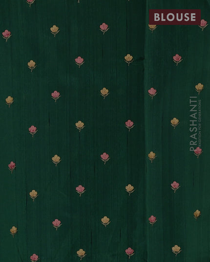 Art tussar saree green with plain body and floral embroidery border
