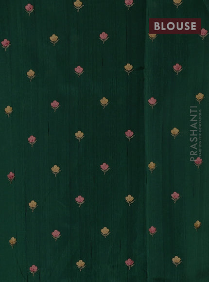 Art tussar saree green with plain body and floral embroidery border