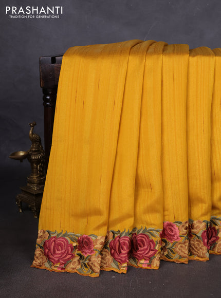 Art tussar saree yellow with plain body and floral embroidery border