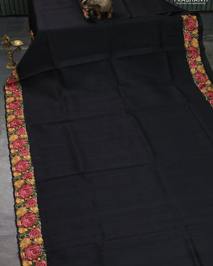 Art tussar saree black with plain body and floral embroidery border