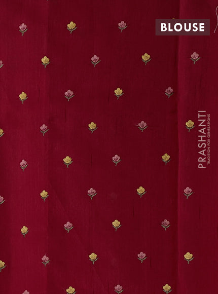 Art tussar saree maroon with plain body and floral embroidery border