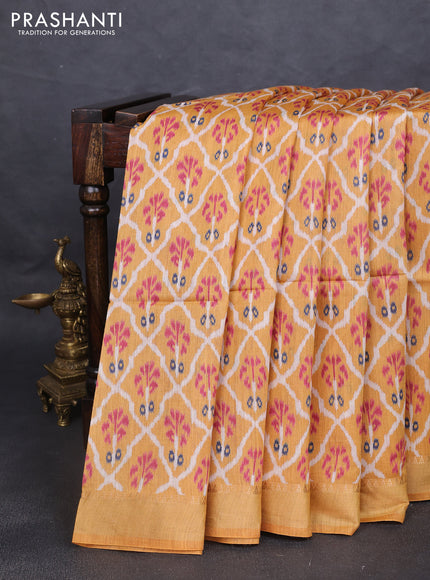 Munga tussar silk saree mustard yellow with allover patola prints and zari woven border