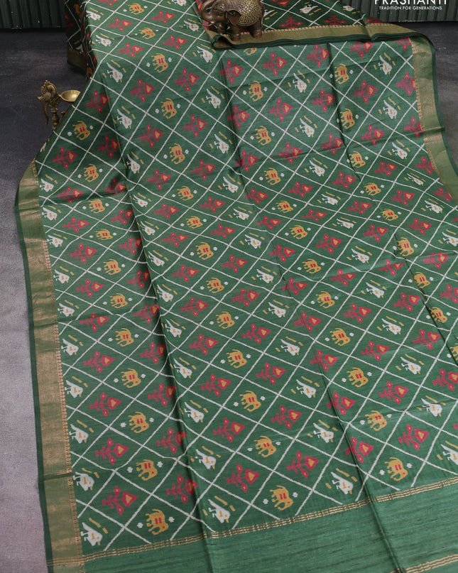Munga tussar silk saree green with allover patola prints and zari woven border