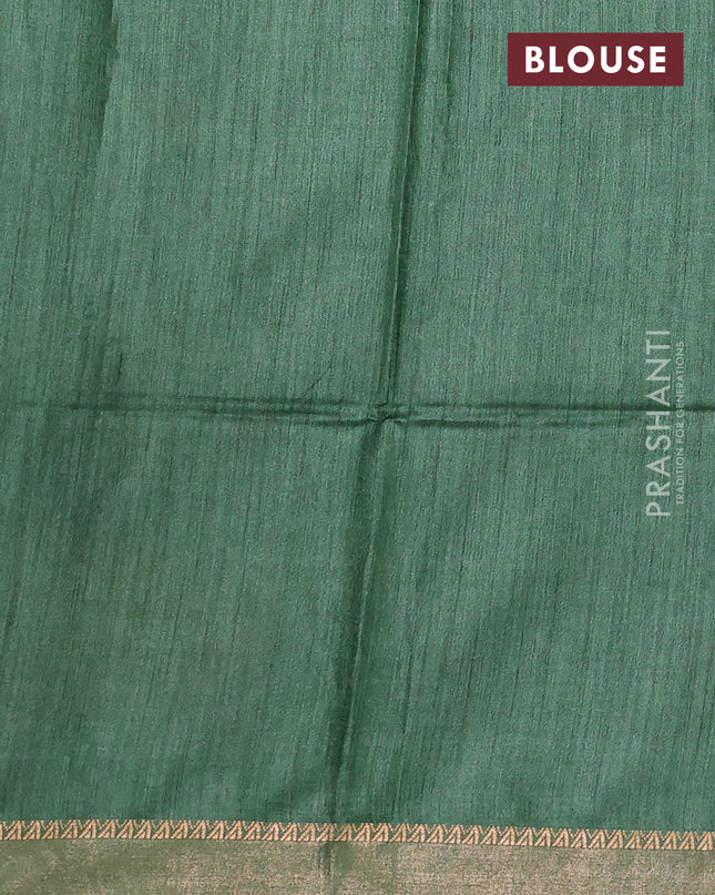Munga tussar silk saree green with allover patola prints and zari woven border