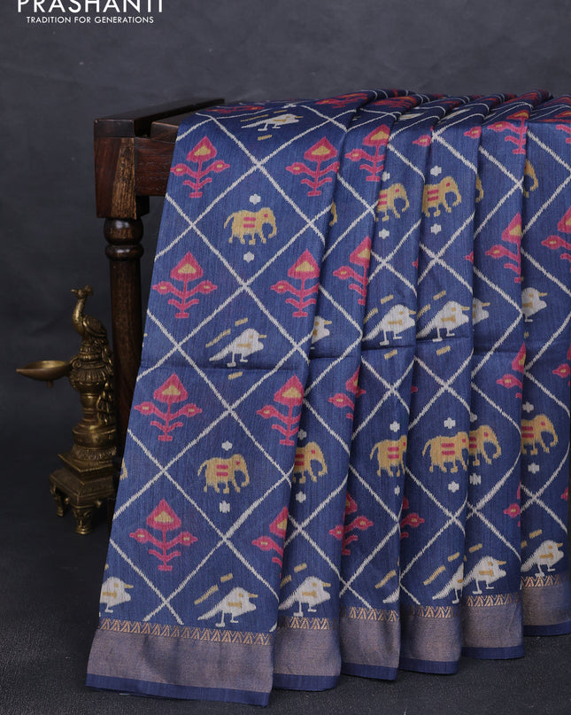 Munga tussar silk saree navy blue with allover patola prints and zari woven border