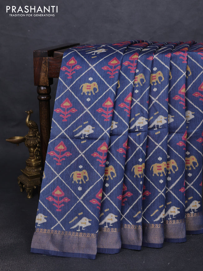 Munga tussar silk saree navy blue with allover patola prints and zari woven border