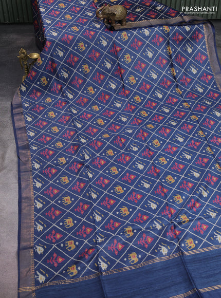 Munga tussar silk saree navy blue with allover patola prints and zari woven border