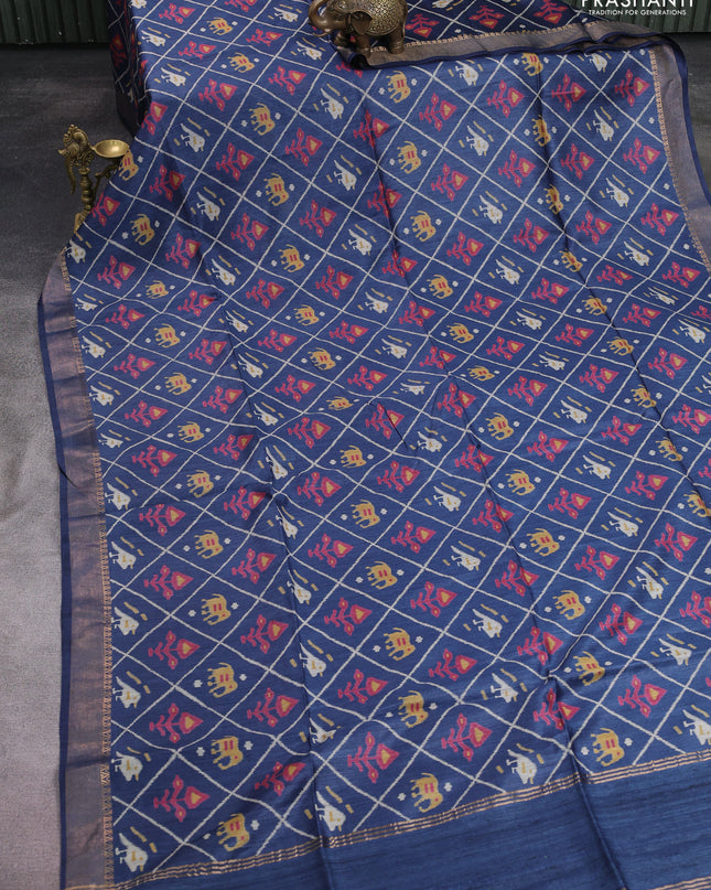 Munga tussar silk saree navy blue with allover patola prints and zari woven border