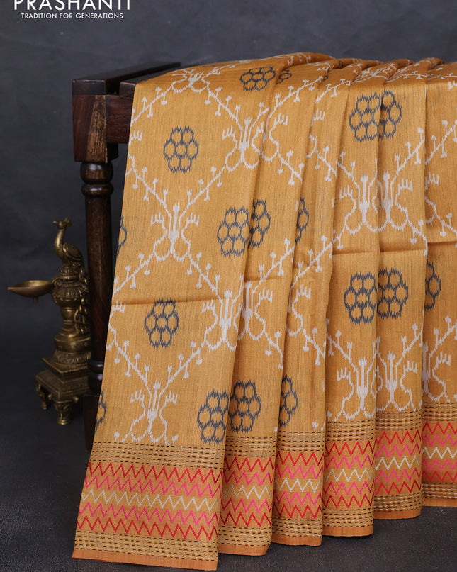 Munga tussar silk saree mustard yellow with allover patola prints and thread woven border