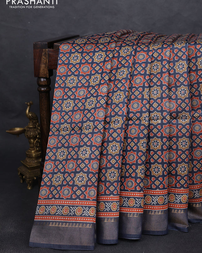 Munga tussar silk saree navy blue with allover ajrakh prints and zari woven border