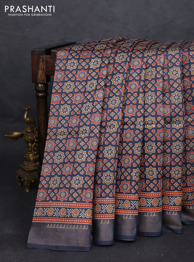 Munga tussar silk saree navy blue with allover ajrakh prints and zari woven border