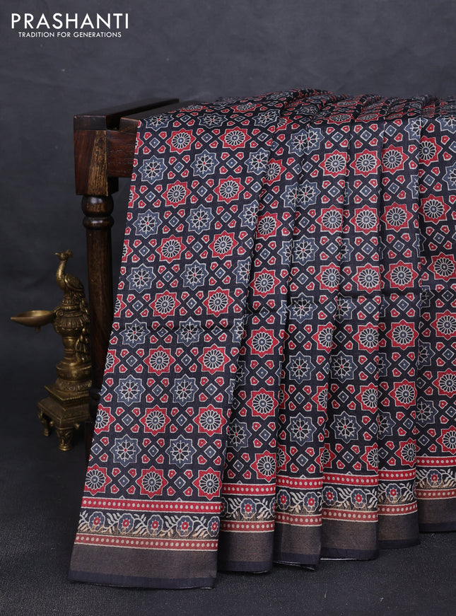 Munga tussar silk saree black with allover ajrakh prints and zari woven border