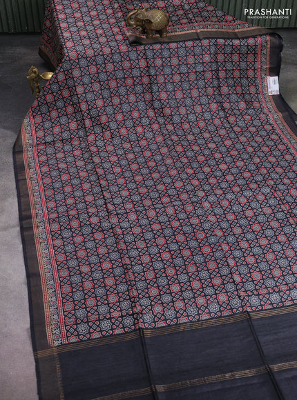 Munga tussar silk saree black with allover ajrakh prints and zari woven border