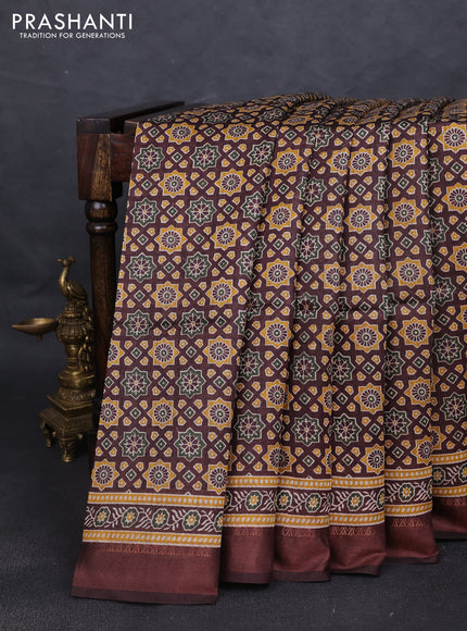 Munga tussar silk saree coffee brown with allover ajrakh prints and zari woven border