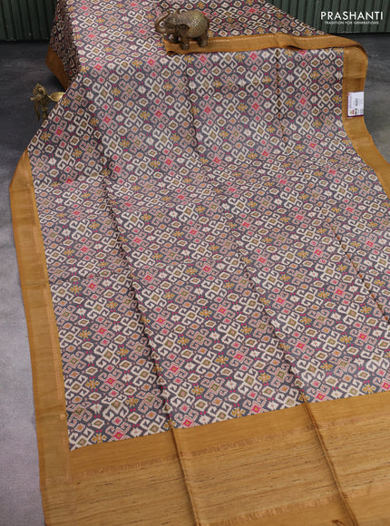 Munga tussar silk saree grey and dark mustard with allover ikat prints and zari woven border