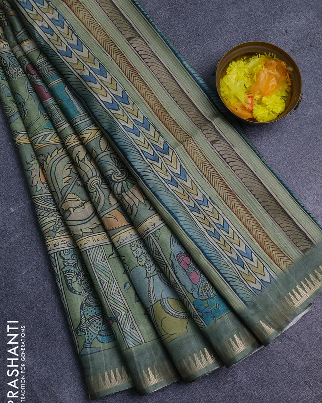 Semi matka saree pastel green with allover kalamkari prints and temple design zari woven border