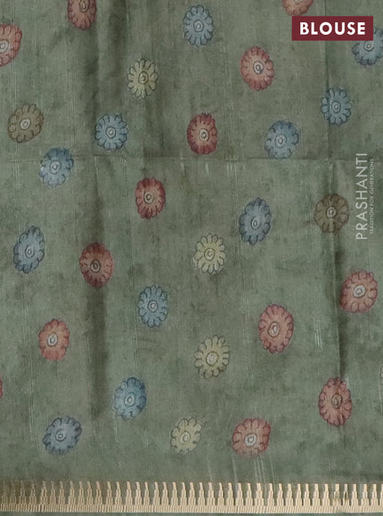 Semi matka saree pastel green with allover kalamkari prints and temple design zari woven border