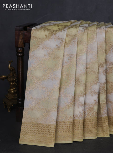 Banarasi silk cotton saree off white and pale yellow with allover zari weaves and zari woven border