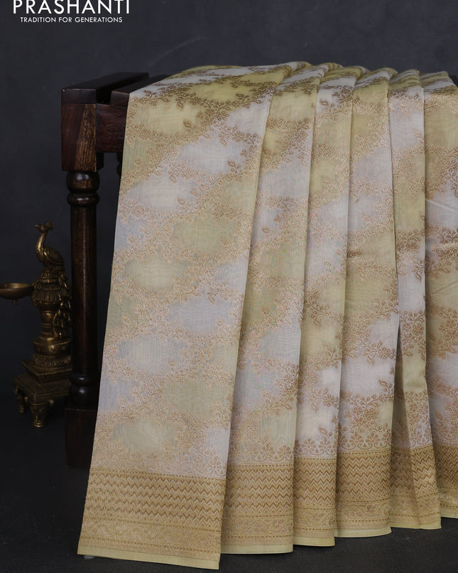 Banarasi silk cotton saree off white and pale yellow with allover zari weaves and zari woven border