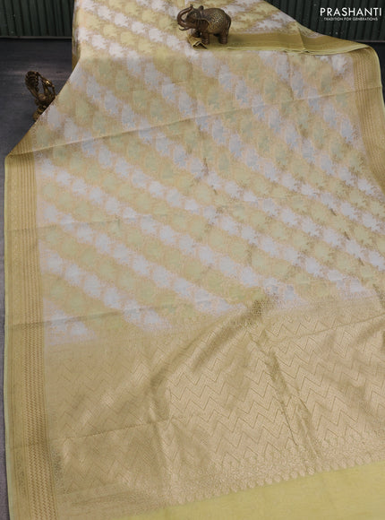 Banarasi silk cotton saree off white and pale yellow with allover zari weaves and zari woven border
