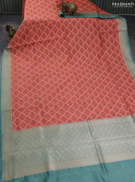 Banarasi silk cotton saree rustic orange and pastel green with allover thread weaves and woven border