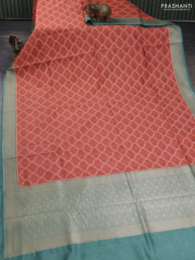Banarasi silk cotton saree rustic orange and pastel green with allover thread weaves and woven border