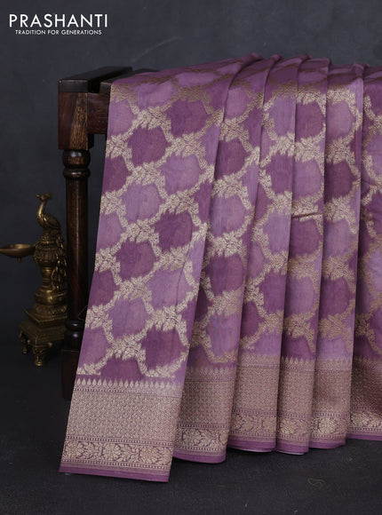 Banarasi silk cotton saree pastel purple with allover zari weaves and zari woven border