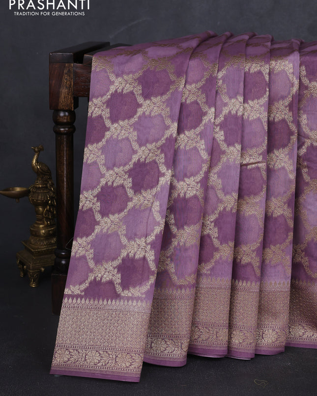 Banarasi silk cotton saree pastel purple with allover zari weaves and zari woven border