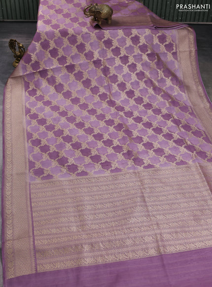 Banarasi silk cotton saree pastel purple with allover zari weaves and zari woven border