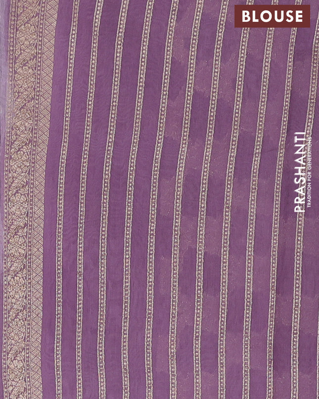 Banarasi silk cotton saree pastel purple with allover zari weaves and zari woven border