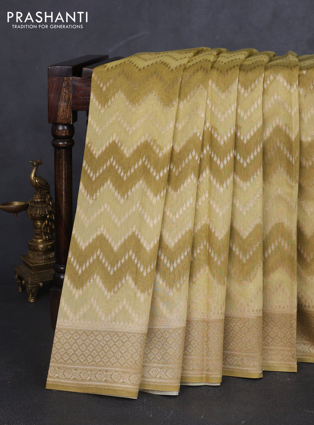 Banarasi silk cotton saree pale yellow and mustard yellow with allover zigzag zari weaves and zari woven border
