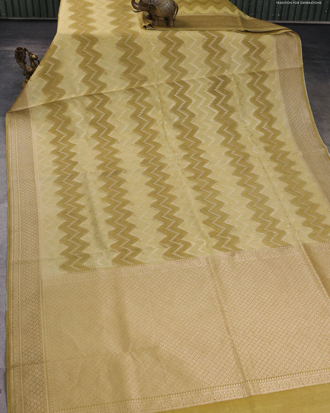 Banarasi silk cotton saree pale yellow and mustard yellow with allover zigzag zari weaves and zari woven border