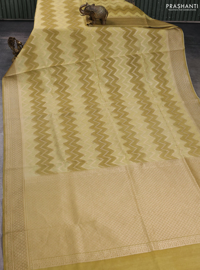 Banarasi silk cotton saree pale yellow and mustard yellow with allover zigzag zari weaves and zari woven border