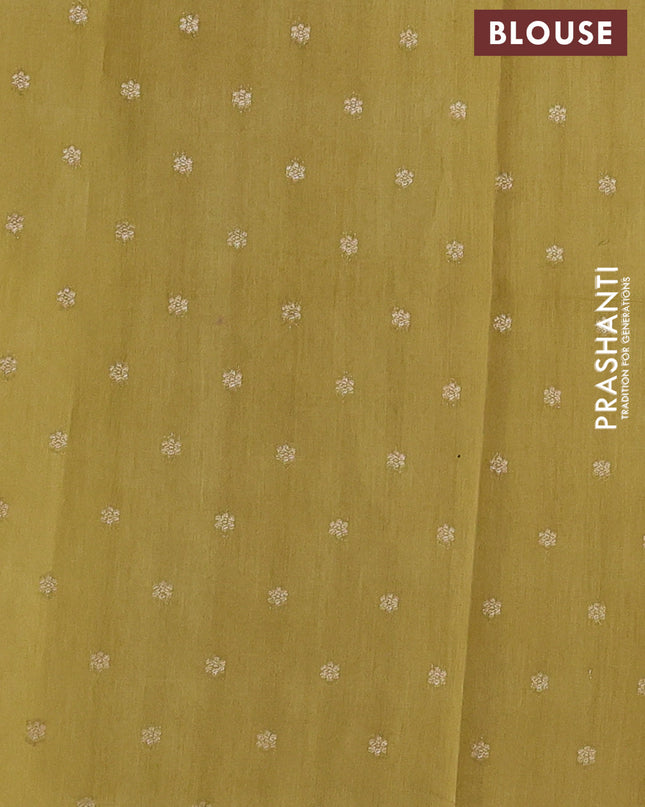 Banarasi silk cotton saree pale yellow and mustard yellow with allover zigzag zari weaves and zari woven border