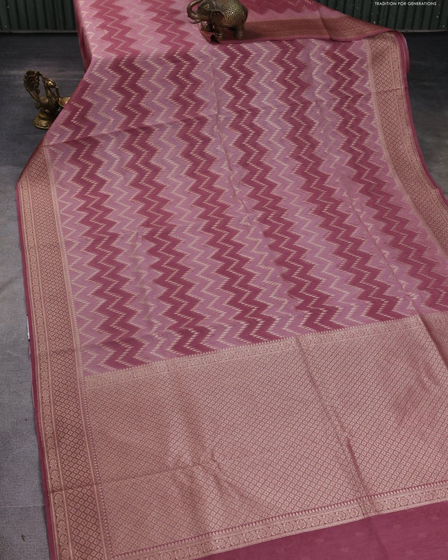 Banarasi silk cotton saree mauve pink with allover zigzag zari weaves and zari woven border