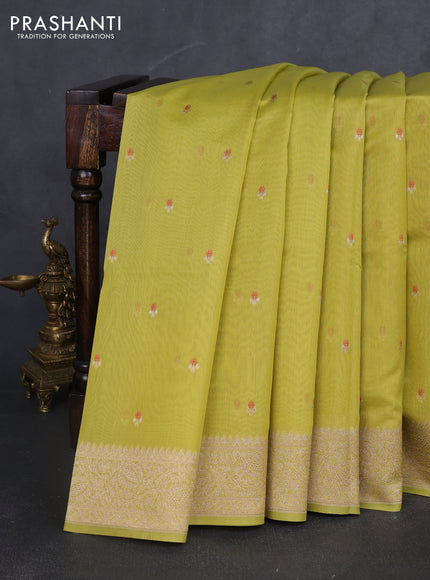 Banarasi silk cotton saree lime green with allover zari woven buttas and zari woven border