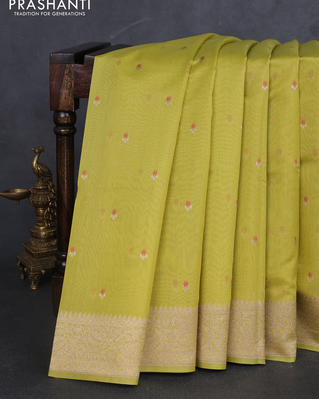 Banarasi silk cotton saree lime green with allover zari woven buttas and zari woven border