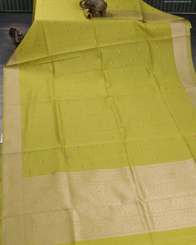 Banarasi silk cotton saree lime green with allover zari woven buttas and zari woven border