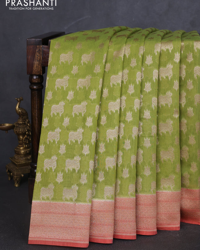 Banarasi silk cotton saree light green and peach shade with allover pichwai zari woven butta weaves and zari woven border