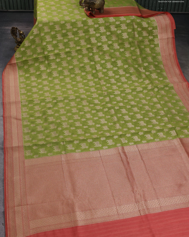 Banarasi silk cotton saree light green and peach shade with allover pichwai zari woven butta weaves and zari woven border