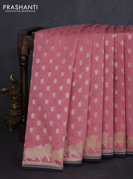 Banarasi silk cotton saree peach pink and navy blue with allover zari woven buttas and pichwai zari woven border