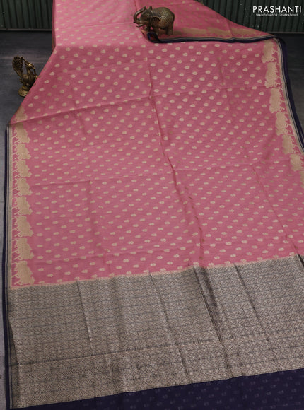 Banarasi silk cotton saree peach pink and navy blue with allover zari woven buttas and pichwai zari woven border