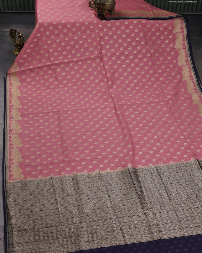 Banarasi silk cotton saree peach pink and navy blue with allover zari woven buttas and pichwai zari woven border