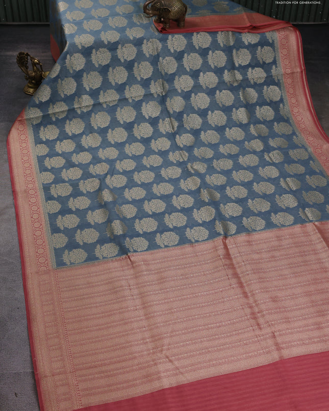 Banarasi silk cotton saree bluish grey and peach pink with allover zari woven buttas and zari woven border