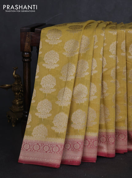 Banarasi silk cotton saree pale yellow and pastel maroon with allover zari woven buttas and zari woven border