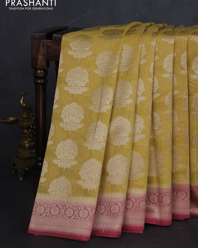 Banarasi silk cotton saree pale yellow and pastel maroon with allover zari woven buttas and zari woven border
